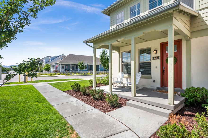Look at the amazing location of this townhome! It's an end unit with plenty of natural light, right by the lake, within a 5 min walk to the beautiful boutique Harmons Market and has easy livability of just 2 floors. The interior is light and bright with many large windows and upgrades galore, including laminate flooring throughout the main level and upgraded carpet upstairs. There are Shaker-style cabinets and quartz counter tops throughout the home. In the kitchen, there's an extra-long 10' island with room for 4 or 5 bar stools, pendant lights above, and 42" upper cabinets with crown molding. The gas range is upgraded with a convection double oven. All the main floor windows are trimmed, and the baseboards are all 5" in a Craftsman style. The beautiful open railings lead to the second-level bedrooms that have 9' ceilings. The primary bedroom has a tray ceiling, and the primary bath has a double vanity and a large walk-in closet. All appliances are included-even the Speed Queen washer and dryer. The HVAC is a Trane system, and the tankless water heater provides on-demand hot water. The internet provided by the HOA is through century link and is hardwired to BR3. The 2-car garage has an easy-maintenance epoxy floor, insulated ceiling, and tons of extra storage. There's a covered patio that's perfect for outdoor entertaining and BBQs. The location offers easy access in and out of Daybreak, it's walkable to the new retail development just to the North, and the corner lot is close to the mailbox and has plenty of street parking for guests. Come take a tour today!