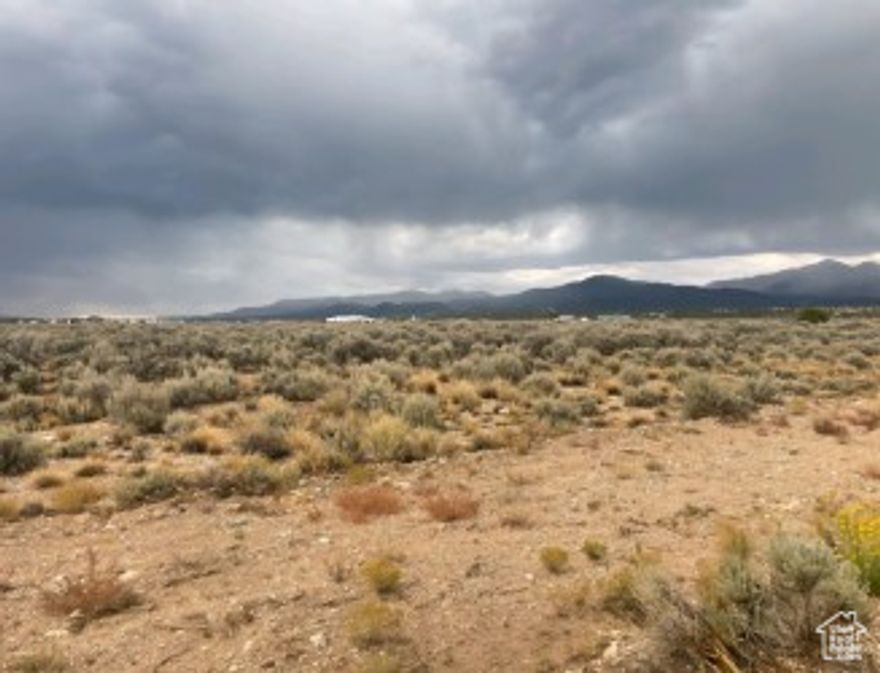 The lot is 5.10 acres and it comes with water rights. This level lot with its wide open space is located in the Mountain Skys Subdivision. Located at the front of the lot its ready for natural gas, electricity, telephone, and cable tv.
