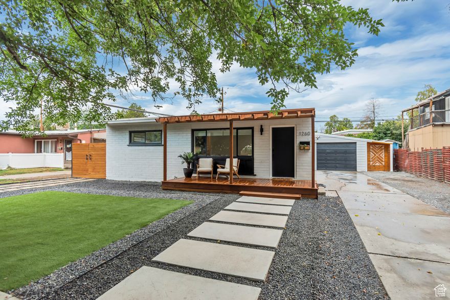 This home is full of character! Each room has something unique to offer, including custom wall decor, built in bunk beds, and hand crafted doors. The outdoor space is inviting, charming, and maintenance free! Even the garage has been thoughtfully organized in a functional way. Everything you could ask for in a beautiful space right in the city. Minutes from I-15 and the SLC airport, and within an hour of 5 major ski resorts, this location is right in the heart of everything Utah has to offer.  Square footage figures are provided as a courtesy estimate only. Buyer is advised to obtain an independent measurement.