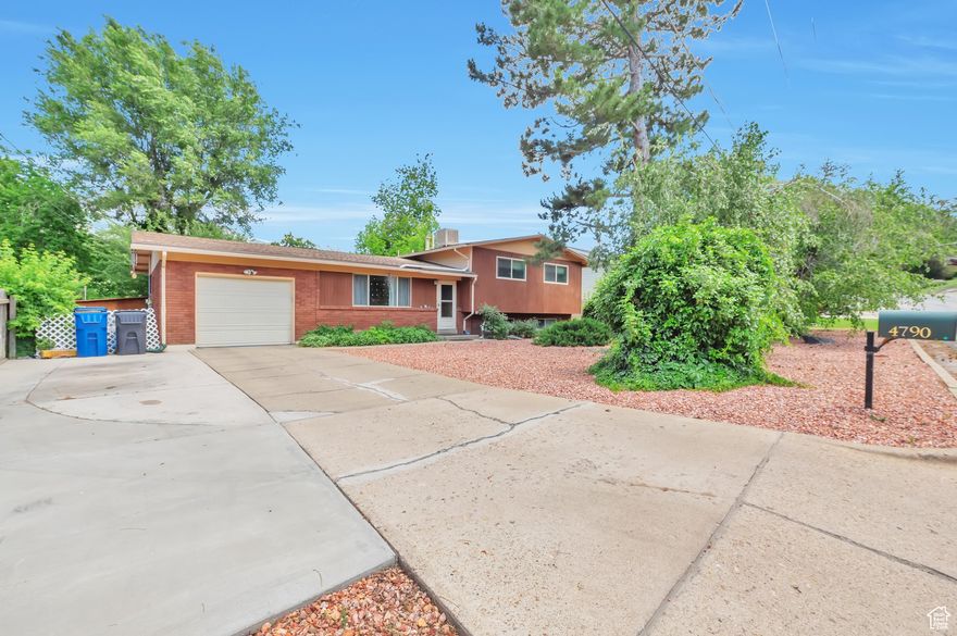 **Motivated Seller** Welcome to your new home nestled in the heart of South Ogden, Utah! This delightful tri-level residence features four generously sized bedrooms and two full bathrooms, perfectly catering to families or those seeking ample living space. Located in a prime area, the property boasts a secluded backyard, offering a serene oasis for relaxation and outdoor gatherings. The home includes a convenient one-car garage and a separate entrance at the back, providing added flexibility and possibilities. With its abundant potential, this home invites you to craft and customize your ideal living environment. Don't miss this incredible opportunity to make this house your forever home!