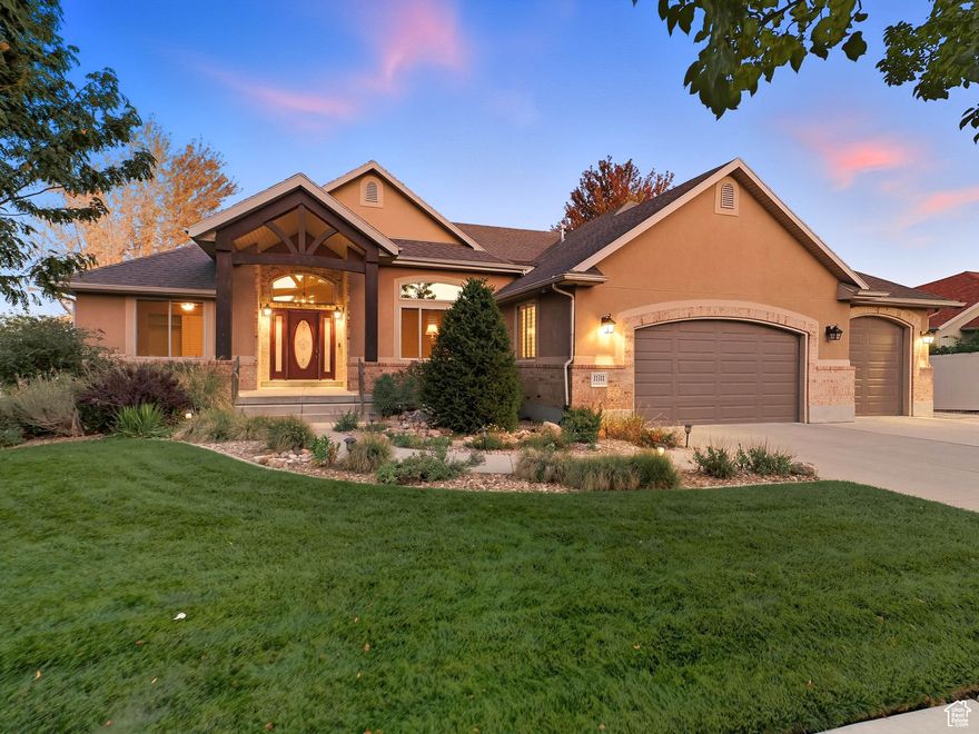 Showings begin at the open house on Saturday the 11th from 10:00-1:00 The perfect blend of timeless design and modern living offering breathtaking mountain views and no HOA. This pre-inspected home provides ultimate peace of mind. The main level captivates with an open-concept design, featuring soaring vaulted ceilings, gleaming oak hardwood floors, and a stunning stone fireplace. The gourmet kitchen is a chef's delight, boasting stainless steel appliances, a gas range, a large island, and seamless access to the covered deck where you can savor the incredible views. The main-floor primary suite offers a private sanctuary with an en-suite bath featuring a separate tub and shower. The fully finished walkout basement is an exceptional highlight, featuring a complete apartment with a second kitchen and a separate entrance-perfect for multi-generational living. This lower level also includes a cozy second family room with another gas fireplace, two additional bedrooms, and direct access to the covered patio. Step outside into your private, fully fenced backyard oasis on a quarter-acre lot, complete with a tranquil water feature and an included hot tub for year-round relaxation. Car and hobby enthusiasts will be thrilled with the oversized 3-car tandem garage with 220V power and a dedicated RV pad with 50-amp service. Upgrades include CAT-5 wiring throughout, a whole-home humidifier, and a water softener. Located just a short walk from The District, this home offers unparalleled convenience to shopping, dining, and entertainment. Don't miss this rare opportunity-schedule your showing today! If the square footage or acreage of the property or improvements is of material concern to the buyer, the buyer is responsible for verifying the square footage/acreage measurements and improvements to the buyer's satisfaction.