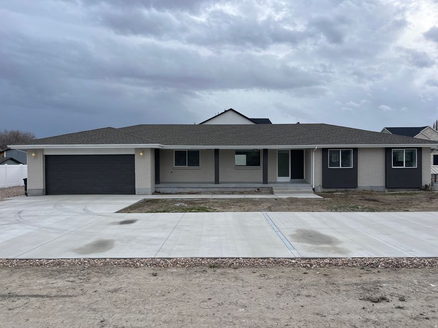 Newly remodeled brick rambler with full basement apartment inc. separate entrance.  Perfect layout for main level living and  rental income in the basement apartment if desired. 3 bedroom plus office upstairs. 2 bedroom plus office in the basement.  Ample parking for cars or RV.  Outdoor patio for entertaining. Buyer will be responsible to finish landscaping.  Home sold as-is.  Seller financing may be an option with minimum $100,000 down.