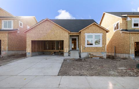 Photo of 12766 S CUTS CANYON DR #139, Herriman, UT 84096 (MLS # 2132635)