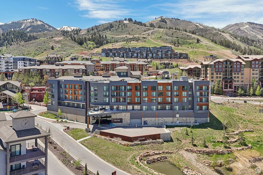 Conveniently located in the heart of Canyons Village, Canyon Haus Park City is just steps from the Red Pine Gondola, shopping, dining, golf, and world-class skiing. Designed with innovation and efficiency in mind, this sleek, fully furnished studio comfortably sleeps four with a queen Murphy bed and twin bunk beds. The turnkey residence features stylish Italian-made furniture, a TV and tech wall, stainless steel appliances, quartz countertops, heated towel bars, and 9-foot ceilings. Floor-to-ceiling sliding glass doors showcase panoramic views-with the Cabriolet passing right outside your window.  Canyon Haus's amenities include a 24-hour front desk, year-round heated outdoor pool and hot tub, fitness center, steam room, game room with arcade and pool table, indoor/outdoor lounge areas, meeting space, private office rooms, ski valet, valet parking, and an on-site market. The Dial-a-Ride shuttle service (via CVMA) connects you anywhere within the village.   Just a short walk to the Upper Village, the Canyon Haus offers ski access via the Red Pine Gondola and Orange Bubble Express, plus access to the Canyons Golf Course and year-round entertainment.