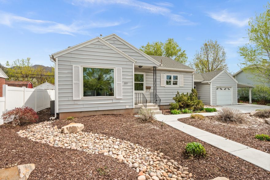 Nestled in a tree-lined eastside neighborhood in Sugar House, this charming home blends classic character with thoughtful updates throughout. Lovely hardwood floors and fresh paint create a warm, inviting feel, while the completely updated kitchen offers modern function and style.  Enjoy the spacious lot with mature trees and full landscaping-perfect for relaxing or entertaining. A delightful breezeway connects the home to the garage, complemented by an extra-long carport for additional parking. Major systems have been updated for peace of mind, including a newer furnace, A/C, and hot water heater-all replaced in August 2024. Buyer and Buyer's Agent to verify all information.  East to show with appointment in Align Showings.