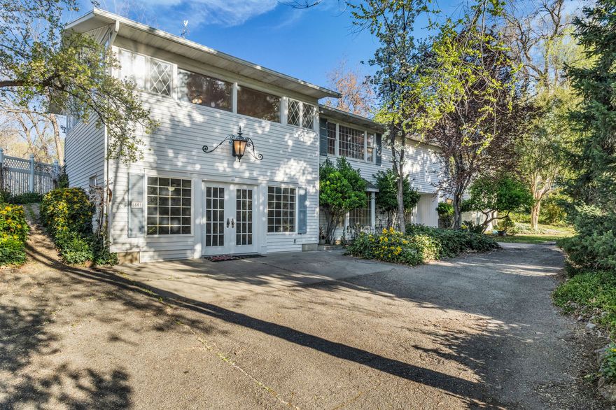 Location, location, location! Ideally situated just steps from BYU, this charming two-story home offers unbeatable walkability to campus, dining, shopping, and entertainment in the heart of Provo. Opportunities like this are rare-whether you're looking for a primary residence, student housing, or a strong investment property, this location is hard to beat.  The home features 4 bedrooms and 3 bathrooms, providing plenty of space for comfortable living, hosting, or rental potential. Inside, you'll find a functional layout with multiple living areas and a warm, inviting feel full of character. Large windows bring in natural light, creating a bright and open atmosphere throughout.  Step outside to a spacious backyard with mature trees, offering shade, privacy, and plenty of room to relax, entertain, or enjoy the outdoors. It's the perfect setting for gatherings or quiet evenings in a peaceful neighborhood.  Several key updates have already been completed, including a new furnace (2023), water heater (2024), updated water lines (2019), and a newer roof (2017), providing added peace of mind and long-term value.  This is a unique opportunity to own a well-located home with character, space, and strong potential in one of Provo's most sought-after areas near BYU.