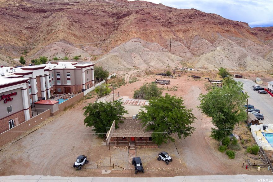 Commercial Main Street acreage with high visibility.  Possibilities are endless! Listing includes: Parcel # 01-0036-0007  1.30 acres - zoned C3 Parcel # 01-0036-0008  0.63 acres - zoned C3 Parcel # 01-0036-0003  9.73 acres - zoned RA1 and RA3