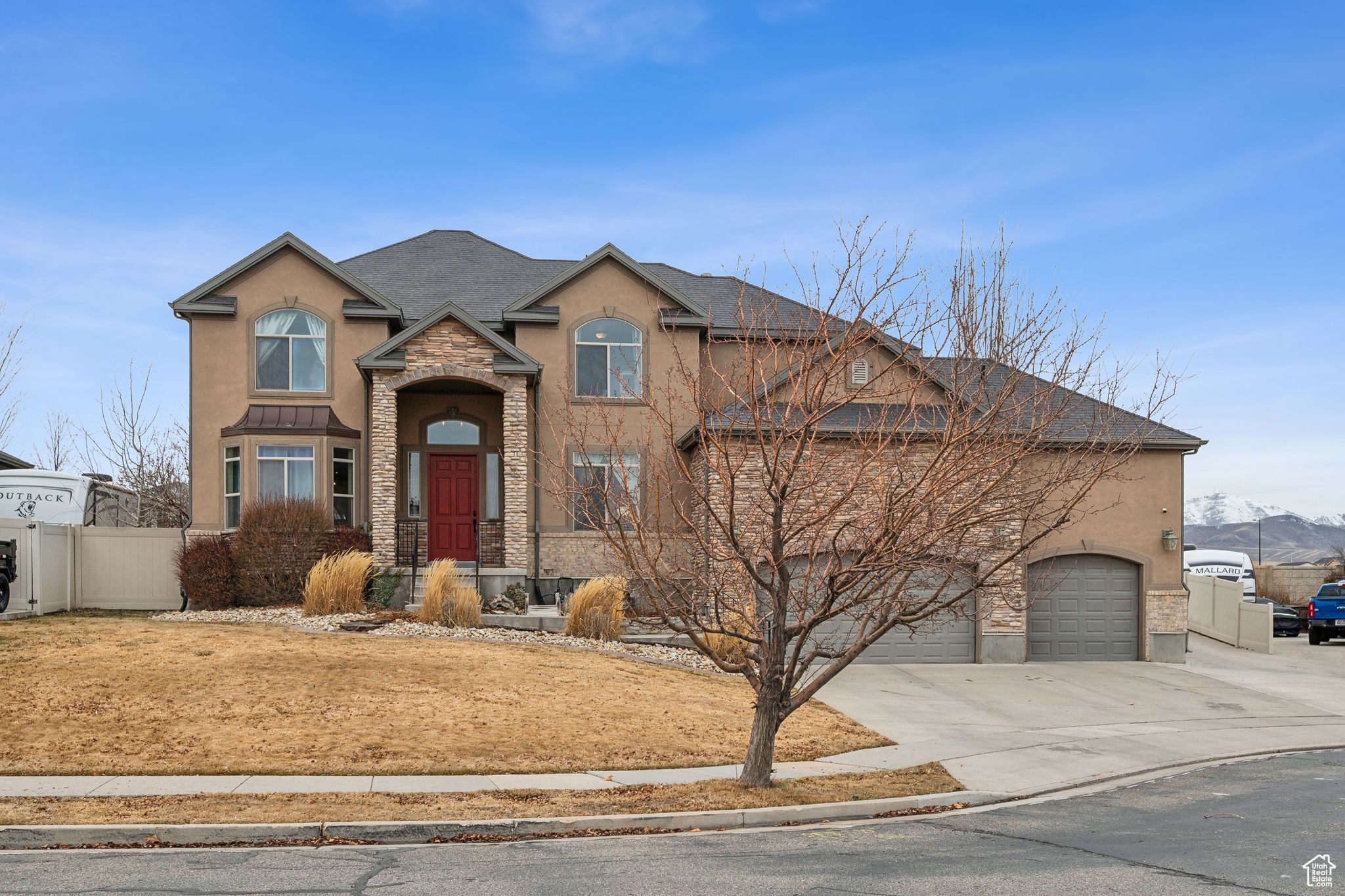 Welcome home to 9036 Coppering Ave. This stunning home is packed with incredible features that will make every day a delight. Here's what this amazing house has to offer: Smart Home Integration: Enjoy the convenience of a paid-off Vivant system that allows you to control various aspects of your home remotely. With the Honeywell phone app, you can manage the two AC units, ensuring optimal comfort throughout the seasons. Outdoor Oasis: The trim lights, beehive smartphone sprinkler system, and landscape lighting enhance the beauty and functionality of your outdoor space. Immerse yourself in the lush surroundings, with mature trees providing ample shade. Spectacular Views: Indulge in breathtaking views looking east across the Salt Lake Valley, as well as unobstructed vistas of the majestic Oquirrh Mountains to the west. Ideal Location: Wonderful community within walking distance to a new elementary school. Quick access to the Mountain View corridor adds to your commuting convenience. Well-Equipped Living Spaces: This home offers spacious bedrooms and large closets, ensuring ample storage for your belongings. 4 of the bedrooms are on the same floor allowing access between the rooms. Abundance of windows allowing natural light and beautiful views all throughout the home. Impressive Extras: Additional features include paved/gated RV storage, 6.5 Ft tall massive overhead storage in garage, 30 amp RV outlet, Jeep top lift, additional garage storage platform, covered back patio with built-in BBQ/outdoor kitchen, radon system for a safe and healthy environment, and a soft water and filtration system for exceptional water quality. The dramatic entry, both inside and out, sets the tone for the grandeur that awaits you. Versatile Basement: The basement provides endless possibilities, with easy potential to add a walkout and create a full mother-in-law apartment. It also boasts lots of storage space, a private safe, and is completely self-contained with a full-functioning kitchen and laundry room. Unique Touches: Stand out from the crowd with a dramatic front entry and copper finishes throughout, which add a touch of luxury. Did we mention the unique touch - a urinal! Yes, you read that right. No more awkward bathroom lines or arguments over who's taking too long. Don't miss the chance to make this remarkable property your own.