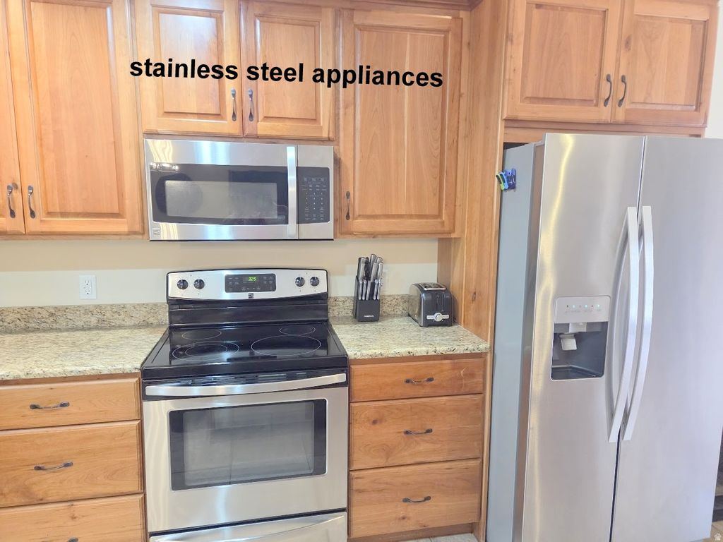 Photo of 10 DESERT WIND DR, Moab, UT 84532 (MLS # 2147065)