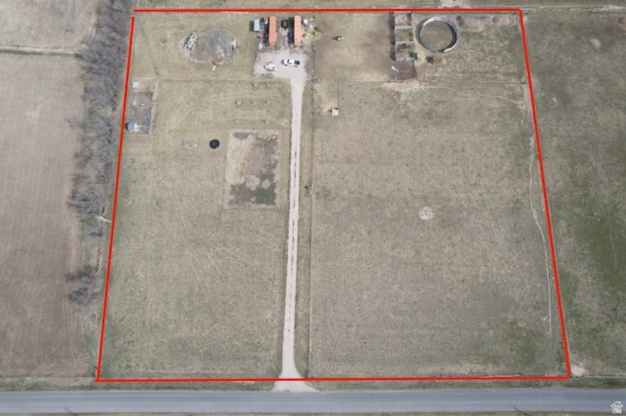 This one is a must see!  5.91 acres with plenty of paved road frontage for building a homestead.  A culinary spring is plumbed to the lot.  17cfs of owned irrigation rights from 5 Mile Creek is also included.  There is a pump and irrigation equipment on site to pressurize the water and irrigate the entire parcel!  Fruit trees are planted, and there is a round pen and 3 stalls already built, allowing you to focus on building your dream home.  Buyer to verify all information.