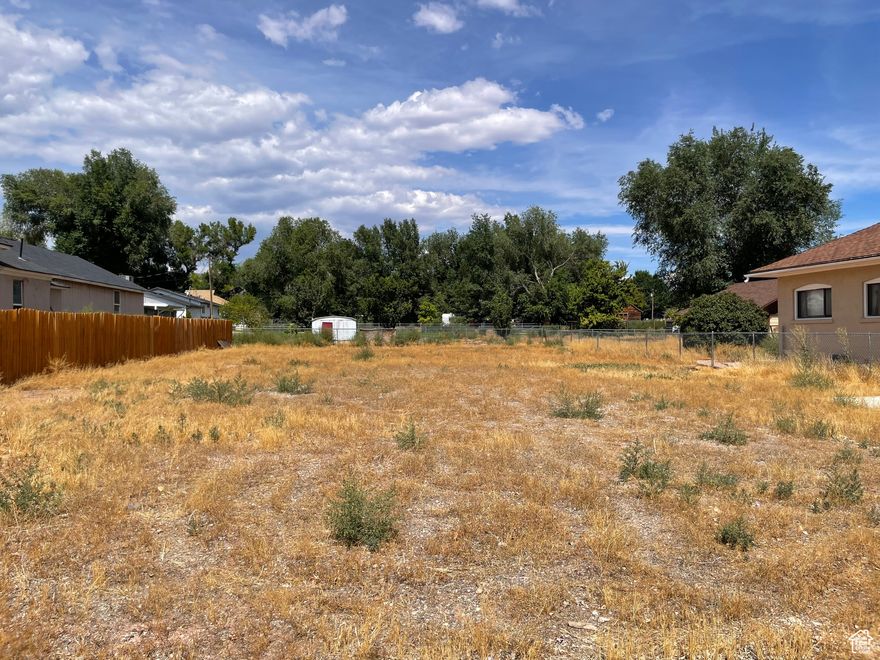 Huge price reduction!!! Flat lot ready to build.  Note: Utilities are on the other side of the road. Price reduced to soften the blow.  Owner/Agent.