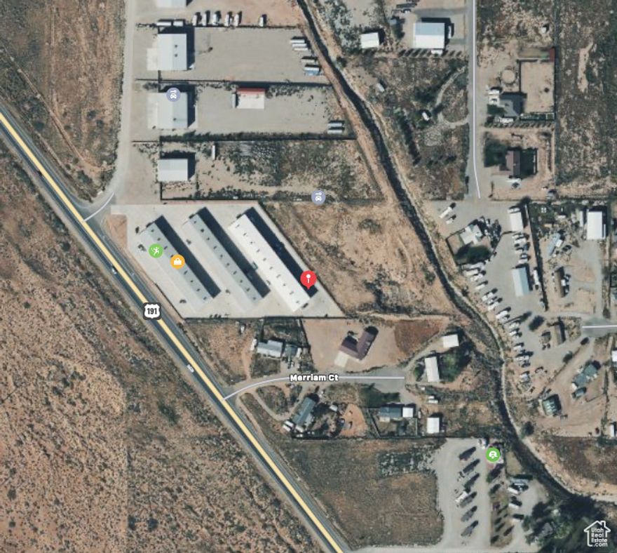 This unique multi-purpose (zoned commercial and residential) property is located in the Moab Business Park, just 6 miles south of Moab, Utah (11850 S. Hwy 191, Unit C1). The unit was built in 2007 and is an unfinished, 1800 square foot shop space (60'X30'). This is an excellent opportunity for an entrepreneur, investor, or local business seeking a live/work setup in Moab. Currently has tenant paying rent month to month. New insulation. Great views of La Sal mountains and the Moab Rim.