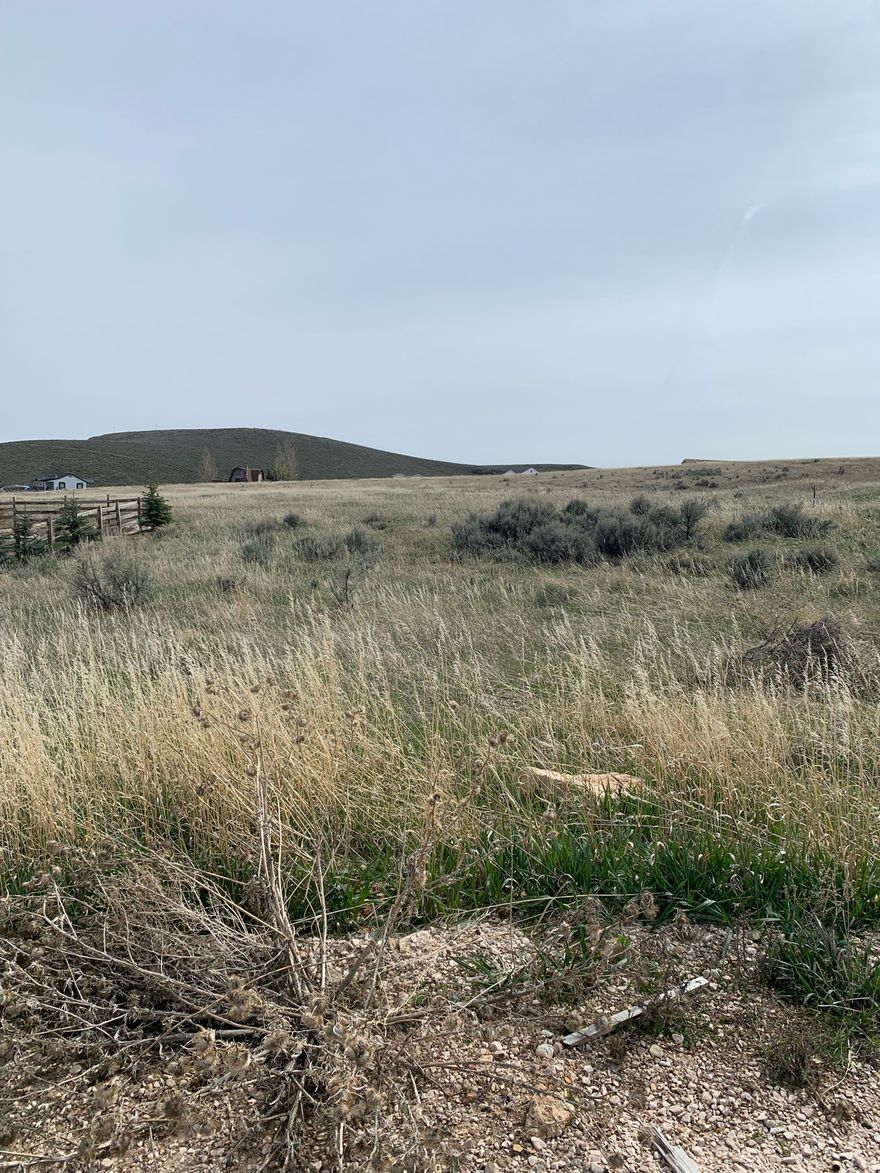 Come build your dream home in Garden City at Sweetwater Golf Course! Lot located on hole ten of soon to be developed golf course! This lot boasts a beautiful lake view and flat terrain. A paved road in front of lot provides both summer and winter fun for year round enjoyment! Utilities stubbed to lot. Short term rentals allowed. Gorgeous engineered building plans for future lake home also included!