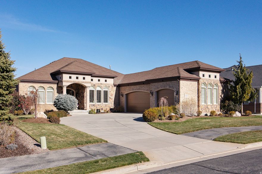 Beautifully maintained custom home with a highly functional floor plan. 2 bedrooms on main was well as a den, dining room, kitchen with breakfast area and bar, laundry room, and a spacious great room. Enjoy a private sanctuary patio conveniently accessible from both the master suite, den and kitchen. The lower level offers a theater room, fitness room, three additional bedrooms, a second kitchen, and another great room. Ample storage is found throughout, along with a three-car garage featuring a dedicated workspace. Eaglepointe Estates in North Salt Lake offers an ideal mix of suburban comfort and urban accessibility. Its well-crafted homes and nearby parks create a lively environment that encourages community engagement and plenty of outdoor recreation.