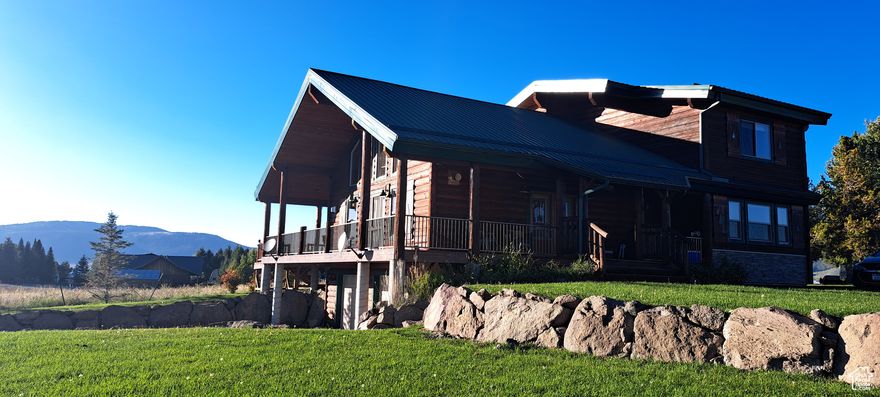 https://youtu.be/GxZcCKqG4hs SUCESSFUL STR!!! Cabin with Amazing Lake and Mountain Views! Just 15 min drive from Yellowstone National Park and 2 minutes for Lake Access on Henry's for World Renowned Fishing! Excellent Vacation Rental  Being SOLD "Turnkey"  Fully Furnished and Ready to Pay for Itself and Give you a Vacation Home to enjoy with Your Family as well! Perched on a Manicured Corner Lot, Beautifully Landscaped, Firepit Area, Room For an RV, and a Huge Deck Wrapping the Home, Overlooking Henry's Lake. Jacuzzi Tub positioned perfectly for Watching the Beautiful Sunsets. Many features such as Panoramic Views from every Window, New Rocked Gas Fireplace, Granite Throughout, Brand New Stainless Appliances, New Fixtures, Vaulted Ceilings with Pine Tongue and Groove and Log Accents throughout and Heated Tile Bathroom Floors, Spacious Main Floor Master bedroom, 2nd Master with 1/2 bath on Main Floor, Large open Kitchen & Dining/Living room and Game Room for Entertaining. Attached Heated Garage for all the Toys. Winter Accessible starting in 2025!!