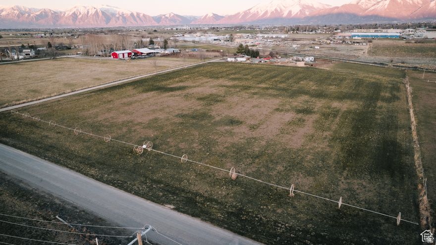 Fantastic Farm Land Master Plan zoned Light Industrial. Great Parcel of property. Comes with well kept home on horse property with fruit trees, alfalfa, garden, etc. Great sunroom to enjoy. Huge deck for entertainment purposes. Great sunset and mountain views