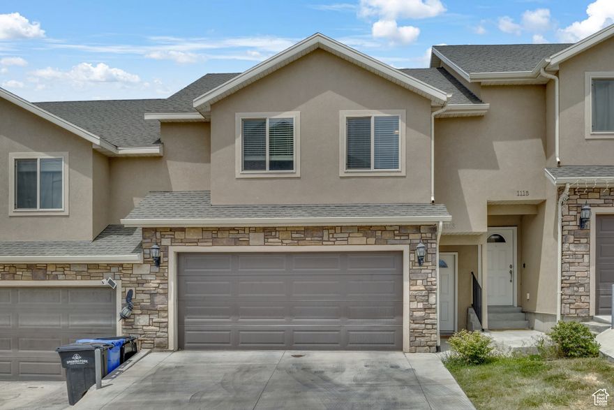 This spacious 3-bedroom, 2.5-bath townhome features modern finishes, an open-concept layout, and the rare luxury of a private, fully fenced backyard-perfect for pets, entertaining, or relaxing. The main floor offers a stylish kitchen with a large pantry and ample cabinet space, plus a cozy living area. Upstairs, the master suite includes a bathroom, walk-in closet, and a private balcony. Two additional bedrooms provide flexibility for family, guests, or a home office. Ideally situated near shopping, dining, and everyday essentials, this home offers quick freeway access for an easy commute and is just minutes from highway 6 and Spanish Fork Canyon for weekend getaways. This home delivers comfort, convenience, and value in one unbeatable package.  When using our preferred lender, you'll receive a free 1% interest rate buydown for the first year (on approved credit) plus a free appraisal. Square footage figures are provided as a courtesy estimate only. Buyer is advised to obtain an independent measurement.