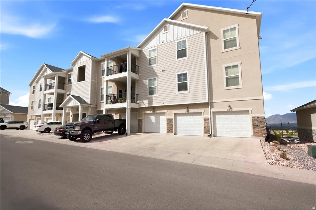 Photo of 14643 S MCKELLEN DR #101, Herriman, UT 84096 (MLS # 2170218)