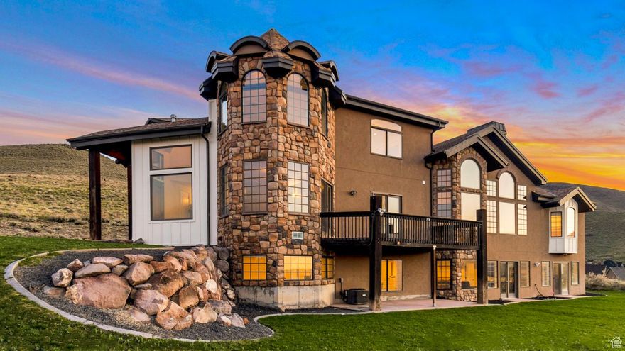 Views! Views! Views! This house sits at the top of the world in Herriman! 360 degree views of the entire valley, the hills of Herriman and the majestic Wasatch mountains! The views in the back of the house feel like you are secluded in the mountains with no other houses by you. Amazing views from almost every room in the house!  The floor plan of this custom home is amazing and very open. The main kitchen and living room have towering vaulted ceilings and feel huge and open. The owners have had several large parties (some with over 250 people) in the house! The house was rented out as a vacation rental for a time and slept over 60 people. The large family rooms and open floor plan of the house makes the house feel even larger than it already is! There are 3 very large family rooms, 2 large full gourmet kitchens. The main kitchen has a giant island and formal dining. Granite countertops and travertine stone tile throughout. Huge theater room with custom surround sound. Giant storage room with tons of shelving in basement. 9 large bedrooms and 7 bathrooms. Large walk-in closets and pantries.  Walk out basement. Even the basement has amazing views! The lower level can be used as a separate mother-in-law apartment with a separate entrance, full kitchen, laundry, etc.   Recently updated with brand new carpets and fresh paint.  Every person that walks through the door drops their jaw and says "Wow! The pictures of this house looked impressive, but they still don't capture how amazing these views are and how big and open this house is!"  Christmas time is amazing in this house with the huge 15 foot Christmas tree and the view of all of the Christmas lights in the valley below. Owner owns the other lots next to this house and is changing lot lines around. This property currently has 2.7 acres, but might possibly have less. Owner can give more details on this. The other lots may be available for sale also after this house is sold. Serious buyers only. Pre-Qual letter or proof of funds required before any showings. Showings by appointment only.
