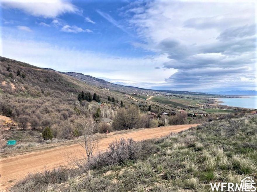 **Seller Financing available** Improved building lot in Swan Creek Village.  Located just West of Bear Lake State Park and State of Utah Marina.  Direct line of sight for Bear Lake views from the ground, not a drone.  Year round access to this ready to build lot.  HOA does not permit short term rentals. All info provided as a courtesy. Buyer and/or agent to verify all.