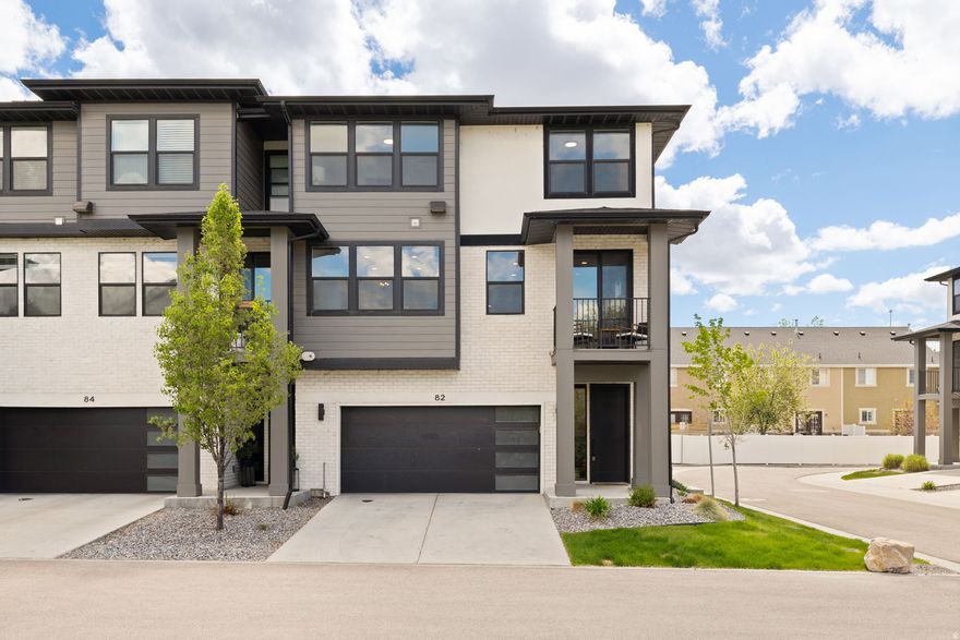Convenient Draper location with stunning mountain views. Built in 2021, this end-unit offers modern design and a prime location just minutes from I-15, Bangerter Highway, and 12300 S for easy access to shopping and dining. Walk to nearby parks, a splash pad, and dog park.  Inside, you'll find a bright, open layout with abundant natural light. The kitchen features stainless steel appliances, a large island, and sleek countertops - perfect for everyday living and entertaining. The spacious living room opens to a private balcony for relaxing. Ideal as a primary residence or investment property. The home can be sold fully furnished for a truly turn-key property.