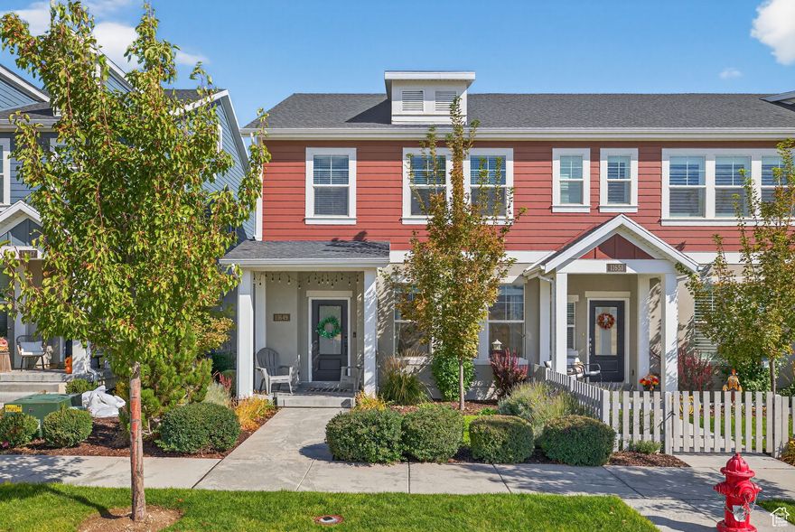 Welcome home! Located in the highly desirable Daybreak community, this beautiful end-unit townhome offers the perfect blend of comfort and modern living. The main floor features an open-concept layout with a spacious family room, stylish half bath, and a bright kitchen complete with a combination island, custom backsplash, and designer lighting. Upstairs, you'll find three bedrooms, including an oversized primary suite with a walk-in closet, plus a conveniently located laundry room. The attached two-car garage includes custom lighting and EV charging. This home feels like new and is ready for you to move right in. Enjoy all the incredible Daybreak amenities-parks, trails, community pools, lakes, and more!