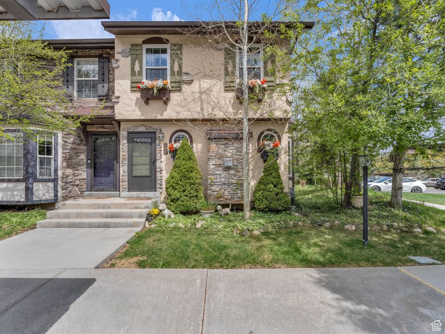 This beautifully maintained 2-bedroom, 2-bath townhome with a spacious loft is ideally located on a prime corner lot in The Hamlet. As an end unit, it features all-new windows, including a bay window in the living room, filling the home with natural light. Mature trees and professional landscaping offer privacy and year-round beauty. Larger than many 3-bedroom units in the community, this townhome boasts an open-concept floor plan with a cozy fireplace, no dividing wall in the kitchen, and upgraded appliances including a gas range, reverse osmosis system, pantry, and center island. Upstairs you'll find two generously sized bedrooms, a loft, and laundry area, while additional storage is available in the crawlspace and a stand-up attic. The extended back patio-three feet deeper than standard-features pavers, a double-size shed, and beautifully planted perennials and trees for added shade and comfort, making it perfect for entertaining. Community amenities include a pool, fitness room, clubhouse, tennis court, and open green spaces. Enjoy unbeatable access to outdoor recreation: 15 minutes to Deer Valley East Village, 25 to Park City or Provo, and 45 to SLC airport. World-class golf, fly fishing, hiking, skiing, and more await just minutes away. This is not your typical 2-bedroom in The Hamlet-it's larger, brighter, and uniquely inviting. Never rented and meticulously cared for, it's move-in ready and waiting for you.