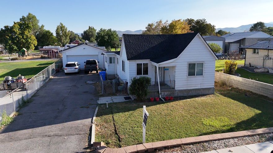 Brand-new roof, water dishwasher. There is a detached extended two-car garage with shop space-ideal for hobbies, storage, or extra vehicles. Inside, you'll find a comfortable layout designed for everyday living. The neighborhood is  close to schools, shopping, and freeway access, it offers both convenience and practicality.