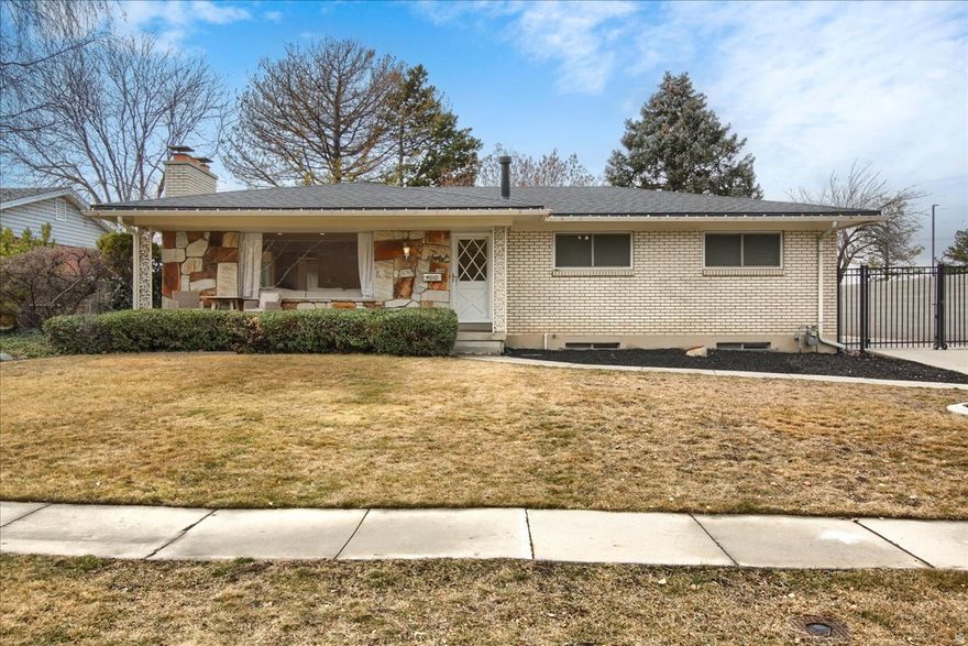 In a quiet Millcreek cul-de-sac, you will find this all brick rambler with a new roof and  views of the Wasatch. This St. Marks neighborhood is conveniently located and close to canyon access. Enjoy beautiful wood floors and a fireplace in the living room. Stainless appliances, a professional vent out range hood, along with a wine fridge round out the updated kitchen. Custom cabinetry and quartz countertops make the kitchen pop! French doors off the dining area lead to a covered back patio with a two car garage and a private fully fenced backyard. Square footage figures are provided as a courtesy estimate only and were obtained from county records. Buyers are advised to obtain an independent measurement and perform their own due diligence. CALL AGENT FOR DOOR CODE.