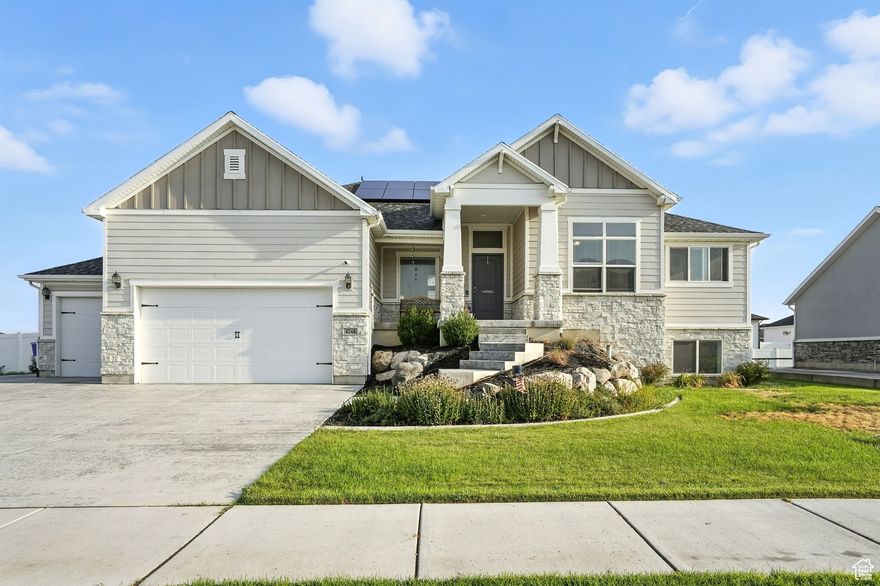 Nestled just blocks from West Davis Corridor and only minutes away from the upcoming West Point City Center, this 5-year-old gem boasts a plethora of upgrades, ensuring modern comfort and elegance. Step into a true gourmet kitchen, complete with a butler's pantry, double oven, and exquisite poplar cabinets. The expansive island, farmhouse sink, and soft-close cabinets are crowned by sparkling quartz countertops. Energy-efficient solar panels paired with whole-home batteries promise peace of mind. Outside, a vast covered deck invites serene relaxation, while the unique basement bunker offers a secure retreat. Dual water heaters ensure endless warmth, and the accessory apartment adds versatility. Don't forget the 5-car garage! All set on a generous .317-acre lot, this home is a rare find in a prime location.