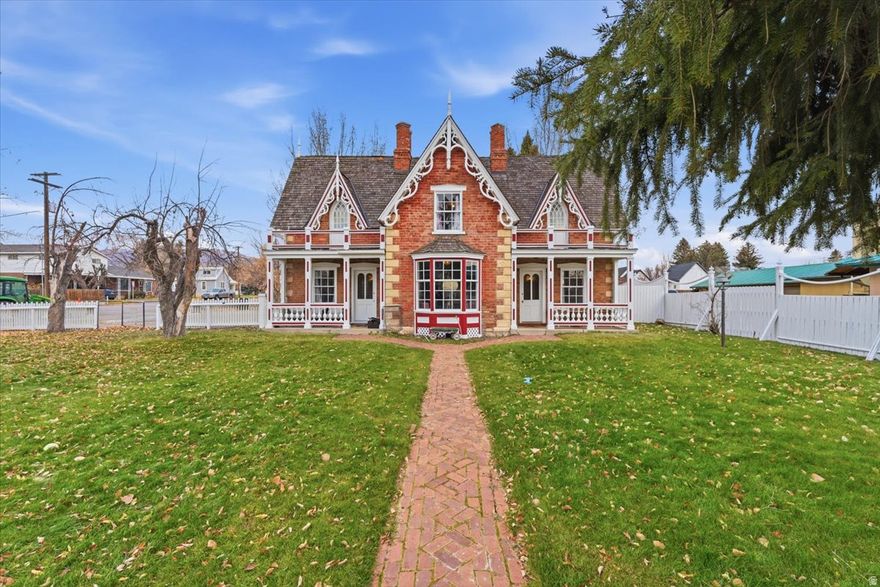 This unique property is zoned for both residential and commercial use and is listed on the National Register of Historic Places for housing. Own a piece of history in the heart of Midway, Utah, on bustling Main Street. This iconic property, located at the famous Bonner Corner, is more than just a house; it represents a legacy. It includes a charming accessory dwelling unit (ADU) with two separate living quarters, along with a beautifully landscaped yard featuring mature trees that blend character and convenience. With its dual zoning and excellent location, this property offers a variety of unique business opportunities and endless possibilities.