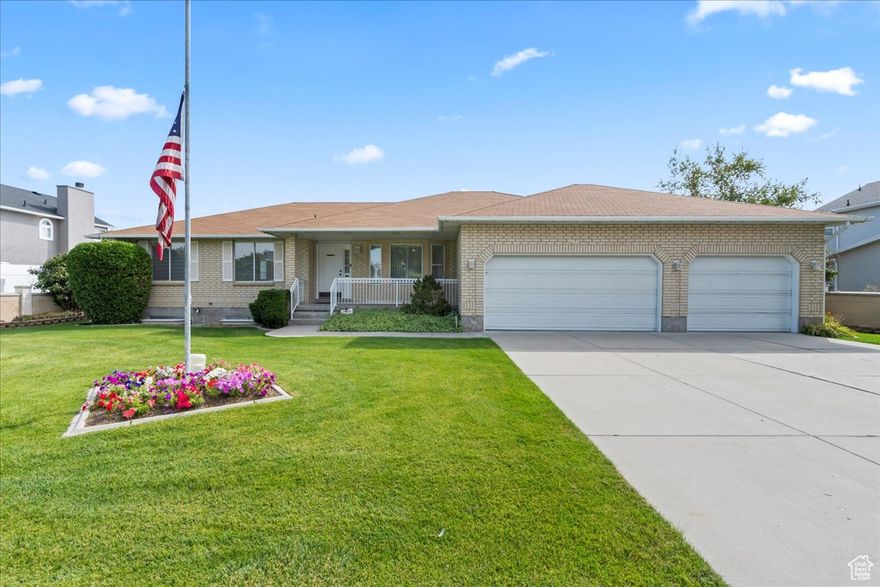 **PRICE REDUCED** Beautifully UPDATED brick Rambler in Prime South Jordan Neighborhood Welcome home to this meticulously cared-for 5-bedroom,  3 bathroom brick rambler in a terrific neighborhood in South Jordan. Convenient access to restaurants, shopping, hospital, and entertainment. With timeless curb appeal and a thoughtfully designed floor plan, this fully finished home has been beautifully updated.  Step inside to a spacious main-level layout featuring vaulted ceilings in the great room, creating an open and airy feel that's perfect for everyday living and entertaining. The master suite offers a private retreat with a separate tub and shower for ultimate comfort. Main-floor laundry adds everyday convenience, and the abundance of storage throughout the home means there's a place for everything. Move in ready this well-maintained gem offers both comfort and opportunity. Terrific 3 car garage with room for a workshop and more.