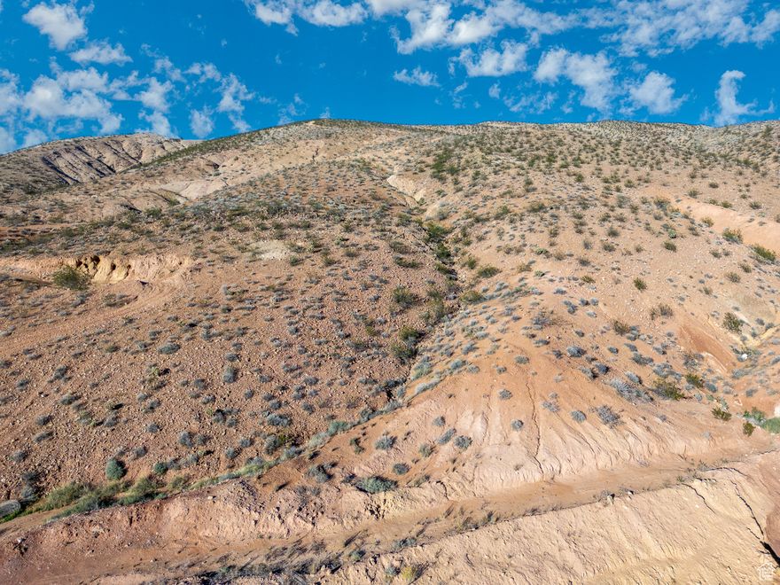 Incredible 5 Acre Property with Stunning Views & Development Potential! Approximately 300 feet from developed lots and road access, this parcel offers breathtaking views of the city, valley, and surrounding mountains. Surrounded by privately owned land, it provides both privacy and opportunity, ideal for a custom home, investment, or future development. A rare chance to own land with unbeatable views and long-term potential!