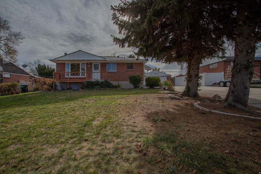 Really cool completely remodeled rambler!  This place sparkles! Quartz tops, excellent laminate flooring, brand new stainless appliances. New carpet. Mini splits in each of the bedrooms and family room. 2 bedrooms and a 3/4 bath down. Massive 2 car oversized detached garage with work bench and tons of storage space. Fully fenced yard. Near schools and shopping. All new and beautiful. You will love the place the minute you walk in!