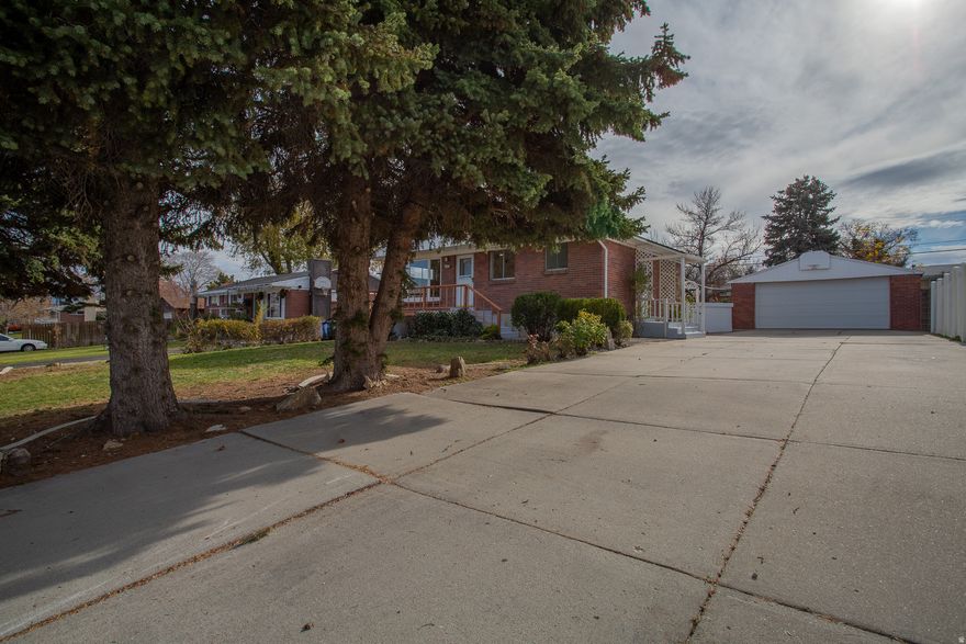 Really cool completely remodeled rambler!  This place sparkles! Quartz tops, excellent laminate flooring, brand new stainless appliances. New carpet. Mini splits in each of the bedrooms and family room. 2 bedrooms and a 3/4 bath down. Massive 2 car oversized detached garage with work bench and tons of storage space. Fully fenced yard. Near schools and shopping. All new and beautiful. You will love the place the minute you walk in!