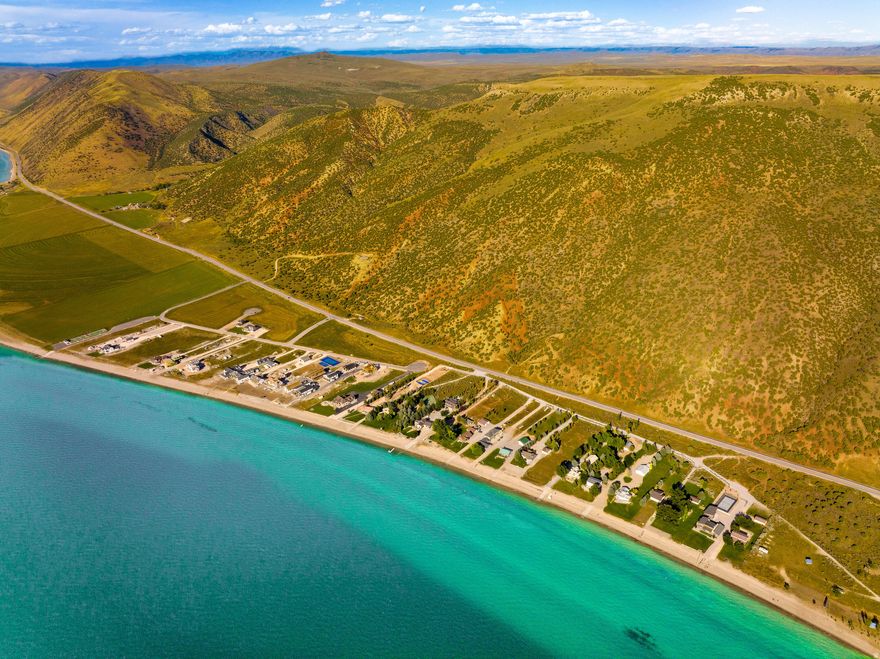 ONLY 5 LOTS REMAIN! Experience the exclusive lifestyle of Eden Ranch, Bear Lake's premier gated lakeside community, located on the serene east shore of northern Utah's stunning Bear Lake-often called "The Caribbean of the Rockies" for its crystal-clear turquoise waters and sandy beaches.  Located in the heart of a region known for its four-season recreation, with easy access, you can enjoy your retreat year-round. This exclusive waterfront community features 36 large 1+ acre home sites. Each lot offers sunset views of Bear Lake and the majestic Cache Mountains. Thanks to a unique topography on the southeast shore, residents enjoy one of the most consistent, usable beach on the lake regardless of water levels, complete with private boat ramp access. Bordered to the north by historic South Eden Ranch's 100+ acres of working farmland and to the west by Bear Lake itself, this sanctuary is both private and open. Just minutes away from the charming towns of Bear Lake Valley, offering dining, shopping, golf, and the area's famous raspberry shakes.  Close enough for convenience, yet far enough that you can get away from the weekend bustle and enjoy some peace and quiet. Private gated community with beach access, boat ramp, high-quality Artesian well water, high speed fiber optic internet, pavilion, tennis, basketball, and pickleball courts. Buyer to verify all information.  Owner/Agent.