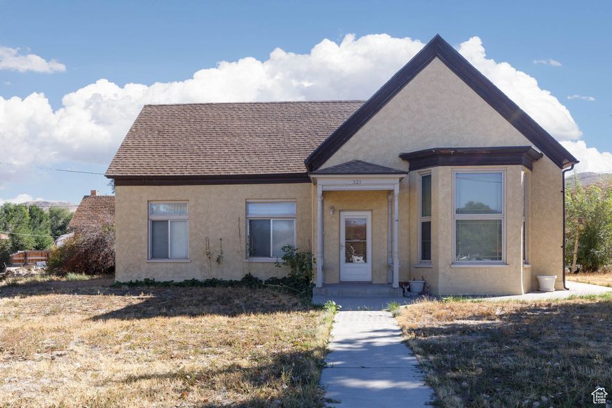 Welcome to this charming residential property in Salina, UT 84654, offering a blend of character and potential! This home features a spacious layout, cozy living areas paneled in warm wood, and an expansive kitchen with classic wood countertops. The large, living room is perfect for family gatherings, while the kitchen includes a unique antique wood stove, adding a touch of rustic appeal.  Situated on a large lot, the property boasts plenty of outdoor space, including a backyard that's a blank canvas waiting for your landscaping ideas. Outbuildings provide ample storage or potential workshop space. Enjoy panoramic views of the surrounding town and distant mountains, providing a serene and picturesque setting.  With its generous living spaces and extensive grounds, this property is an excellent opportunity for anyone looking to invest in a home with both privacy and community feel. Don't miss out on the chance to put your personal touch on this quaint home with endless possibilities! Property is being sold "as is" with all remaining personal property incuded.