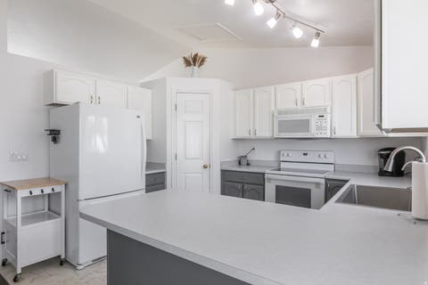 Tiny photo for 5902 W WOLF CREEK CT S, Salt Lake City, UT 84118 (MLS # 2180088)