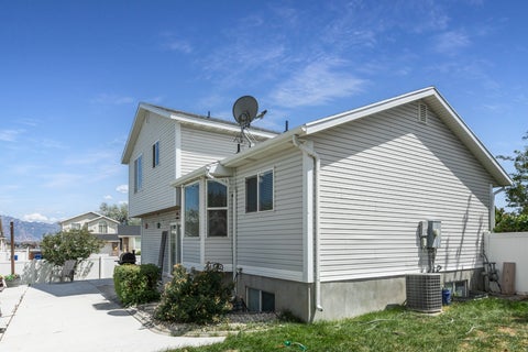 Tiny photo for 5902 W WOLF CREEK CT S, Salt Lake City, UT 84118 (MLS # 2180088)
