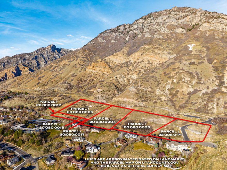 13.7 Acres close to BYU campus and the "Y" with incredible views of Utah Lake.   It is currently agricultural property but could potentially be rezoned into several residential lots. Sold as raw land and it currently has a cell tower lease.   Price is $73,000/acre or $1,000,000 total price and consists of 7 parcels being sold together.   Power sewer, telephone & water are all available in the lower Terrace Dr. street and in some places power boxes & phones on site.