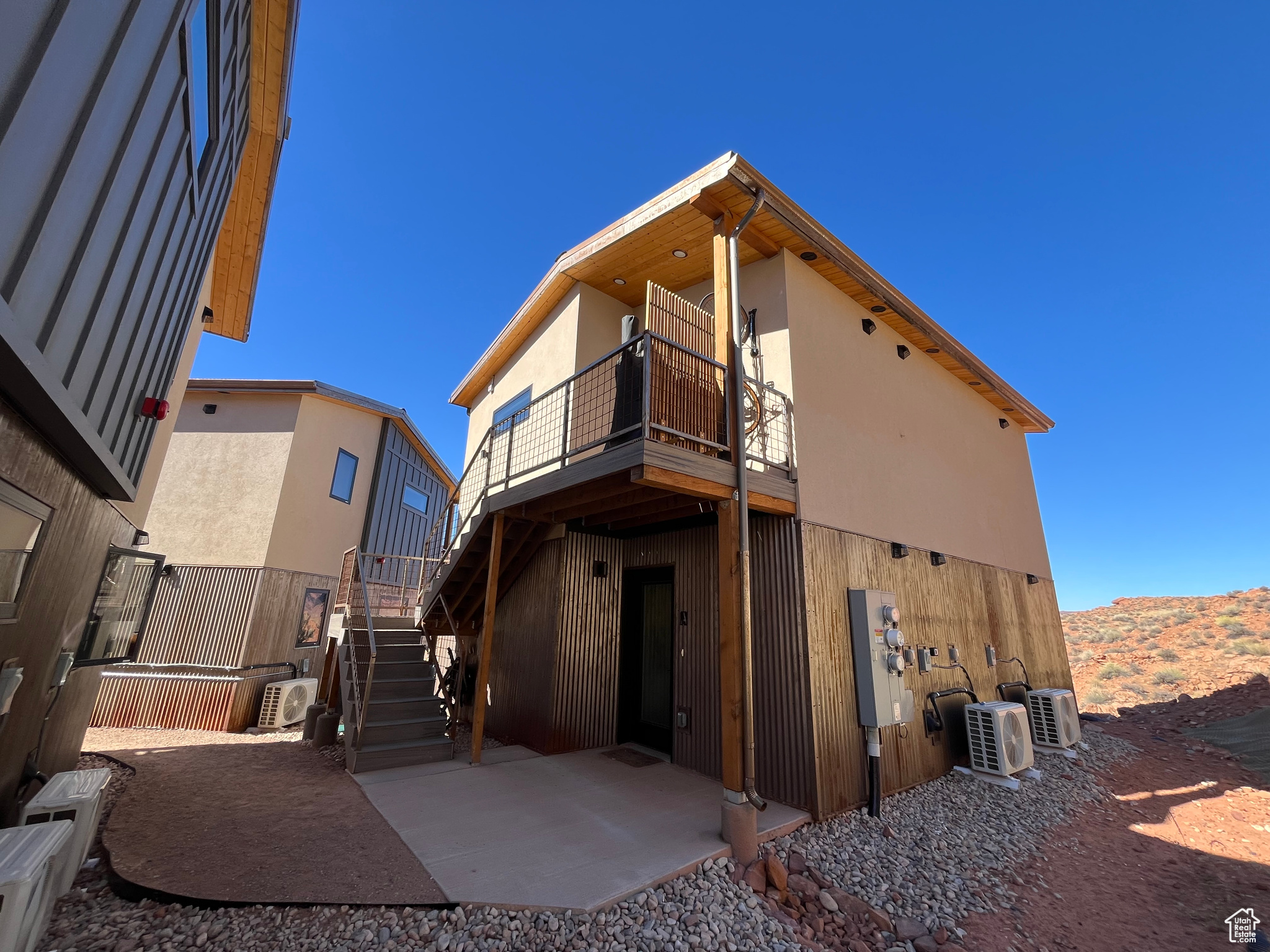 RARE 2-BEDROOM MURPHY FLATS CONDO! Welcome to Murphy Flats Unit 202B - a beautifully maintained 2 bed, 1 bath elevated second-level condo offering modern comfort and unbeatable access to Moab's adventure lifestyle. At 614 sqft, this is the only two-bedroom unit currently available in the community, making it a rare opportunity for buyers. Enjoy an open, efficient floor plan with thoughtful design throughout, maximizing both space and function. The home is in amazing condition and features a private balcony with stunning views of the Moab Rim. This unit includes 2 deeded parking spaces, a private storage unit, and covered bike parking-perfect for all your outdoor gear. Murphy Flats offers exceptional shared amenities including a community garden, fire pit, and dog park, all within a welcoming neighborhood less than two miles from downtown Moab. All information deemed reliable by the listing office; buyer to verify all.