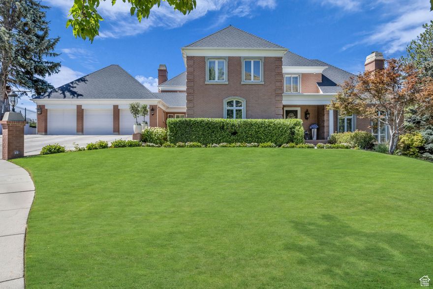 Experience the best of Salt Lake City luxury living. Set on a private cul-de-sac in the coveted Federal Heights neighborhood, this 9,155 SF estate blends timeless architecture with an unbeatable lifestyle - minutes to world-class skiing, vibrant downtown dining, and endless outdoor adventure. Designed by renowned Beverly Hills architect Lance Turner, this Federal Heights home makes a statement from the moment you arrive. A well-appointed foyer opens to a formal living room with stained glass windows, a great room with soaring ceilings and floor-to-ceiling windows, and five oversized fireplaces that bring warmth and elegance throughout. Built with the highest quality craftsmanship, this Salt Lake City luxury home features solid wood doors, oversized trim, intricate crown moulding, and custom architectural details that showcase timeless design and artistry. The gourmet kitchen, featuring granite countertops and premium Wolf, Sub-Zero, and Bosch appliances, is perfect for both intimate dinners and large-scale entertaining both indoors or outside on the private balcony. Upstairs, the grand primary suite, set apart from the other bedrooms, features another private balcony, dual fireplaces, and his-and-hers closets. Every bedroom includes natural light and windows framing city or mountain views. The walk-out basement boasts a large family room with an oversized fireplace and kitchenette, plus a sport court to brush up on pickleball and basketball skills - a rare luxury. Outside, lush hydrangeas frame a private patio with stunning Wasatch Mountain views. A pool can be added (see virtual images in photos). Ideally located just steps from hiking and biking trails, across from the University of Utah and Primary Children's Hospital, and only minutes to downtown Salt Lake City dining, shopping, and cultural venues, this property offers unmatched convenience. With world-class ski resorts close by, it's the ultimate blend of city sophistication and mountain living. This is a rare opportunity to own one of Salt Lake City's premier luxury homes. All information provided as a courtesy. Buyer to verify all listing details, including square footage and acreage.