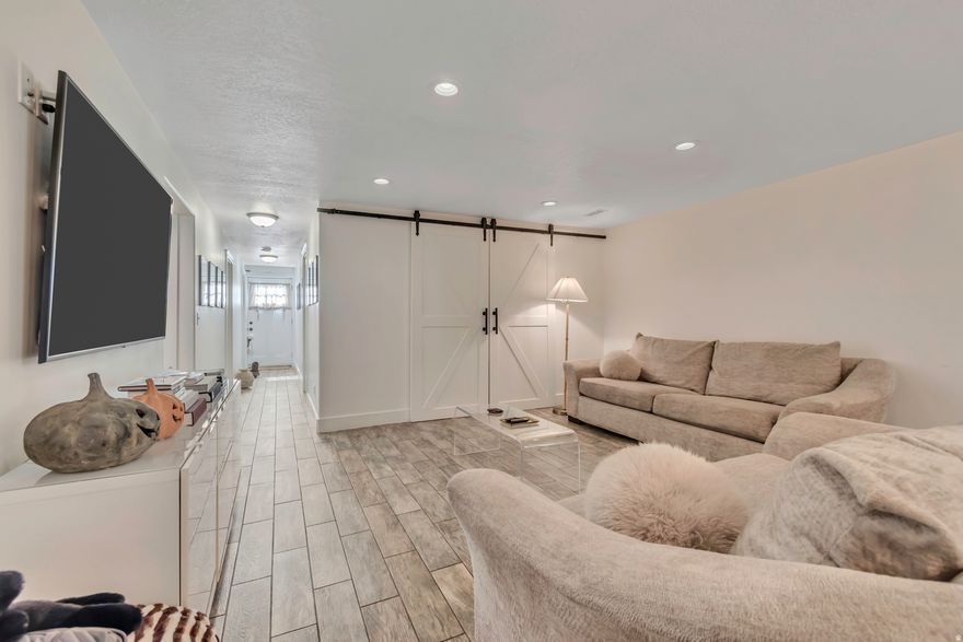 Don't miss this former model home! You will be impressed with the open floor plan, tile floors in the wet areas, Knotty Alder dark wood cabinets w/ Crown, Raise Panels, and Staggered; granite counter tops, stainless appliances, vaulted ceilings, bay windows, plantation shutters. The master bedrooms features a large walk in closet, bay windows, a double sink vanity, Jetted tub and separate shower. You will enjoy the large private backyard all summer, it is fully fenced with fully automatic sprinklers. Brick & Stucco; Granite-Entire Home; Jacuzzi w/ Separate Tile Shower; 20 Inch Tile in Entries; Kit/ DR, & Baths; Two Tone Paint. Please allow a 24 hour notice whenever possible for showings. Home and apartment are occupied. Square footage figures are provided as a courtesy estimate only and were obtained from Davis County. Buyer is advised to obtain an independent measurement.