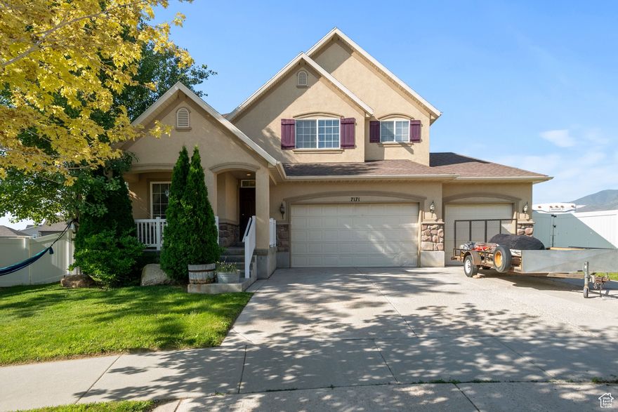 Discover this spacious 5-bedroom, 3-bathroom home in the heart of West Jordan, Utah. Situated on a large, nearly quarter-acre lot, it offers ample outdoor space. The interior features soaring vaulted ceilings and a bright, open layout. A large 3-car garage provides plenty of storage. The basement includes a private one-bedroom, one-bathroom apartment with separate laundry, perfect for multi-generational living or rental income. A versatile, move-in-ready home in a prime location.