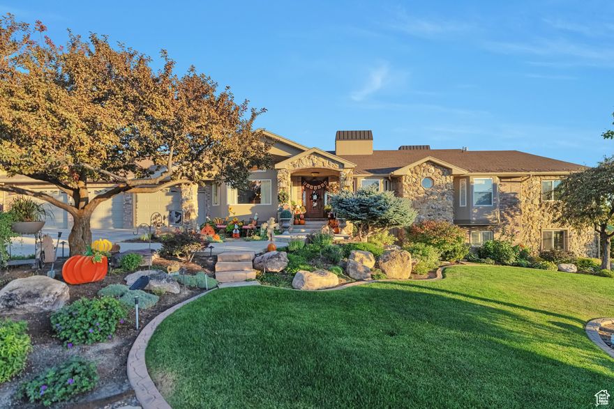 Stunning home and property with so many amenities. The home features include granite counter tops, hardwood flooring, hardwood custom trim, huge master suite, multiple laundry rooms, two kitchens and loads of storage space. This is a one of a kind custom home in a desirable bench neighborhood with views of the mountains and valley. The exterior of property features a Full sports court for tennis, pickleball, basketball, a 30x40 detached shop, a clubhouse/chicken coop and immaculate landscaping that is complete with fruit trees, grape vines, garden areas, waterfall, firepit, covered deck and patio areas. For more information or for a private showing please call listing agent.