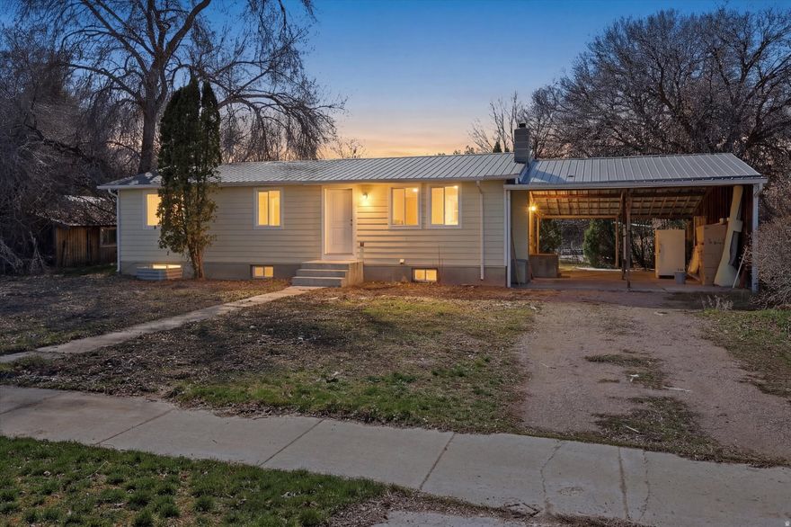 Welcome to your perfect slice of small-town charm in Malad City, Idaho  this fully remodeled home is just steps away from the brand-new elementary school, making it an ideal spot for families or savvy investors! From top to bottom, inside and out, it's been transformed with premium finishes that scream quality. Upstairs, you'll fall in love with the stunning granite countertops in the kitchen, and the amazing master suite that's a true oasis, featuring a double vanity and a beautifully tiled tub/shower surround for ultimate relaxation. Downstairs, the separate 2-bedroom basement apartment is a game-changer  complete with all-new cabinets, a fresh kitchen boasting granite counters, and its own washer/dryer hookups (plus separate ones upstairs). It's primed for generating rental income, helping offset your mortgage, or even converting into a duplex setup. This turn-key beauty is move-in ready, with a massive carport that could easily fit 2 cars (or more if you're Tetris-proficient!), topped by a low-maintenance metal roof and clad in brand-new, high-end siding  none of that flimsy vinyl nonsense. Call to schedule your showing today!