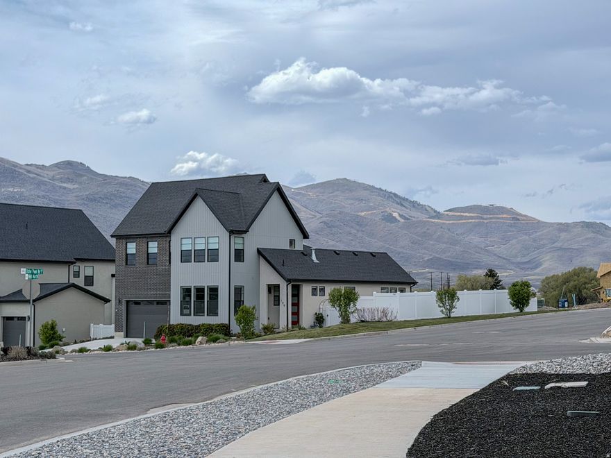 This is a fully furnished, turnkey, short-term rentalapproved home.  No rental restrictions in this community. Features include a gourmet kitchen with Wolf cooktop, double ovens, oversized island, Lutron window shades, and TVs in nearly every room.  The spacious layout offers 6 bedrooms (4 kings, 2 queens), 2 offices, 2 family rooms, plus dedicated exercise and game areas. Outdoor living shines with mountain views, an oversized patio, and a fenced fully landscaped backyard with a 6-person hot tub.