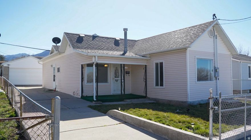Step into charm with this adorable 3 bedroom, 1 bath home in Tooele!  Built in 1910, this cozy home blends character with comfortable everyday living.  Warm and inviting spaces make it easy to feel right at home.  The detached 2 car garage adds extra storage and flexibility, and the yard is just the right size to enjoy without a lot of upkeep.  A great opportunity for anyone that loves the charm of an older home at a great price. Freestanding wardrobes in bedrooms are included.  Buyer is advised to obtain an independent measurement.  Figures shown are provided as a courtesy and obtained by county records.