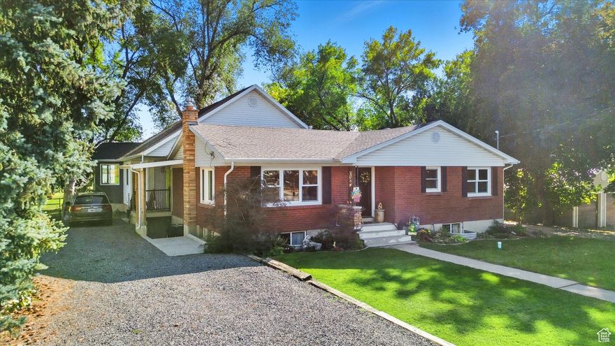 UNIQUE doesn't even begin to describe this property.  It has endless possibilities.  The home includes 3 kitchens, 3 separate living spaces, options galore.   The finishes throughout the entire home are gorgeous with colorful trim, brick walls, unique layouts, custom cabinetry and beautiful flooring.  A large family could occupy main floor living and basement then still have a mother in law apartment, or separate living spaces with extended family.  There are too many options to list. 7 bedrooms could be 8, 5 bathrooms and sitting on 1.76 acres with 2 out buildings while being surrounded with beautiful established trees.  This property boasts panoramic Cache Valley views and spectacular sunsets. Property includes 1 1/2 shares of water along with the ability to have 3 horses, stalls and tack room or space for other animals.  It really is one you have to see in person to appreciate all the detail to the home, the options it could provide, and the amazing yard.  Square footage figures are provided as a courtesy estimate only and were obtained from county .  Buyer is advised to obtain an independent measurement.
