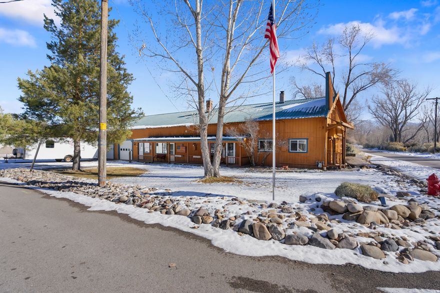 This versatile property has a layout that opens the door to a lot of different possibilities! The main house has 6 bedrooms, 4 full bathrooms, and 2 half bathrooms, with 4111 square feet and two kitchens and two laundry rooms, making it easy to use as two separate living spaces if needed.  Attached to the home is a large shop with four separate bays, offering approximately 3,452 square feet of functional workspace-great for storage, projects, or business use.  There's also a separate detached building with two individual units. One unit includes a kitchen and bathroom, and the second unit has a bathroom, creating great potential for guest space, rental income, or flexible use.  If you're looking for a property with space, flexibility, and real income potential, this one checks all the boxes!  Year built is unknown and taxes to be determined.